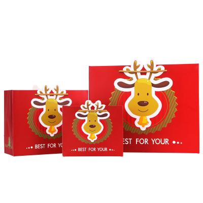 China Recyclable Christmas Gift Bag Cartoon Cute Deer Pattern Gift Paper Bag for sale