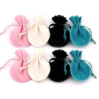 China Recyclable Round Multicolor Cosmetic Gift Bag Jewelry Bag Drawstring Velvet Bag Custom Logo for sale