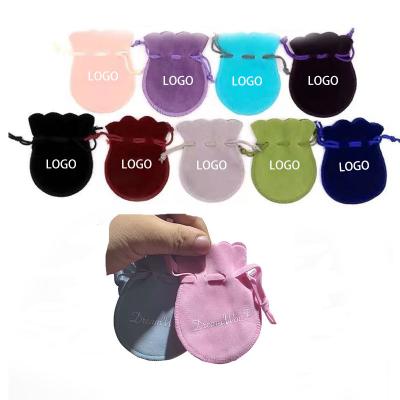 China Custom logo recyclable cheap fashion custom drawstring velvetpouch candy bag for jewelry makeup pouch for sale