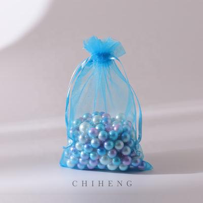 China Blue Lake Eugen Gift Yarn Bag Suitable For Gift Small String Bag Cheap Wholesale Organza Tote Bags for sale