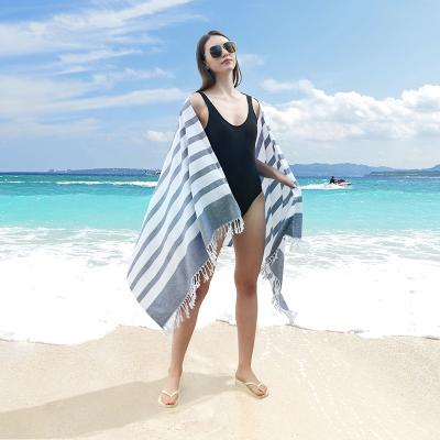 China Custom wholesale QUICK DRY 100% cotton peshtemal turkish beach towels with tassels for sale