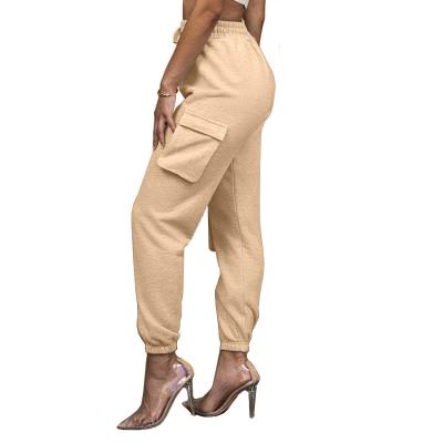 China Fashion Plus Size Women's Casual Solid Color Pocket Drawstring Tie Pants Casual Sweatpants Trousers for sale