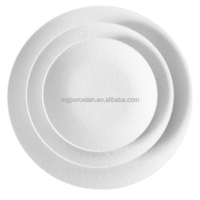 China Viable White Occasional Set Round Flat Plates Matte Glaze Ceramic Handcraft Porcelain Dinner Dishes Dinnerware for sale