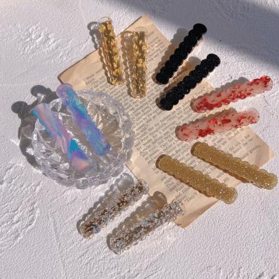 China Wholesale Fashionable Platypus Acrylic Side Clip Gold Color Candy Girl Soft Word Clip Clip for sale