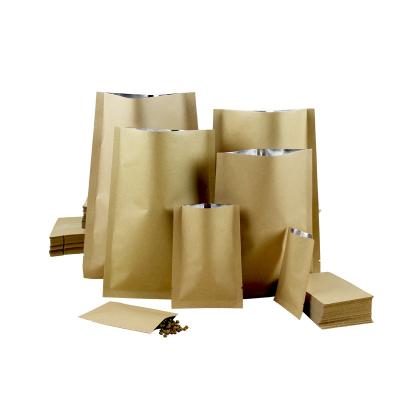 China Disposable Aluminum Foil Coated Inside Compressed Fresh-keeping Bag Customized Kraft Paper Three Side Sealed Food Packaging Bag for sale