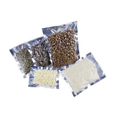 China Disposable Plastic Food Bags Translucent Aluminum Film Vacuum Sealing Flat Pouches In Stock for sale