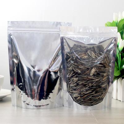 China Disposable Clear Up Pouch Glossy Clear Front Ziplock Plastic Bag Resealable Aluminum Foil Pouch Disposable Stand Up Pouch for sale