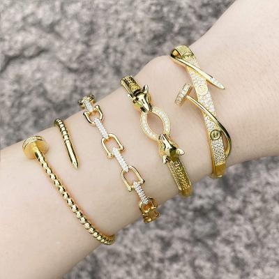 China TRENDY Fashion Luxury Hip Hop Jewelry Nail Leopard Head Bracelet Crystal AAA Cubic Zirconia 18K Gold Plated Bangle For Women for sale