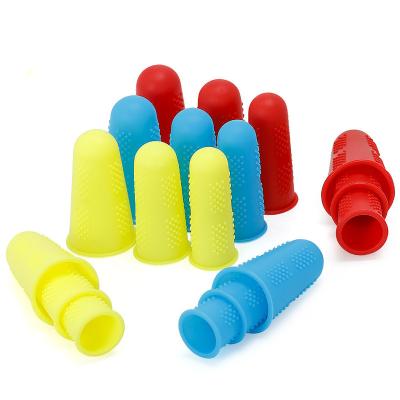 China Reusable Anti-Slip Silicone Finger Sleeve Protector Tip Cover Finger Caps For Sewing Crafts Cooking Kitchen Tools for sale