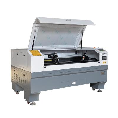 China Reci Tube 150w 1390 Water Cooled CNC CO2 Mixing Laser Cutting Machine For Metal And Non Metal for sale