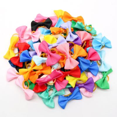 China Stocked Cute Macaron Solid Dog Hair Bows with Rubber Band Headwear Cat Dog Accessories for sale