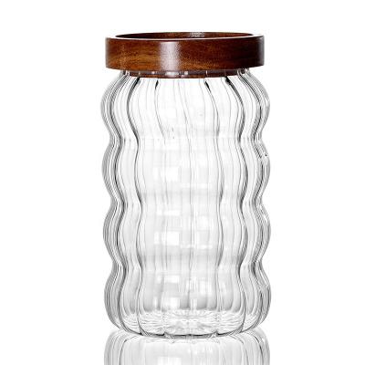 China Custom High Stocked Borosilicate Glass Stocked Jar With Lid Wooden Bamboo Kitchen Food Storge for sale