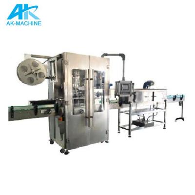 China Easy Operation Round Bottle Labeling Machine AK-S150 PVC Shrink Sleeve Labeling Machine With Glass Bottle Labeling Machine for sale