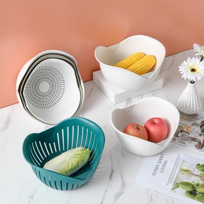 China Creative Stocked Kitchen Sink Drain Basket Double Layer Nordic Style Fruit Dish Household Sink Drainer for sale