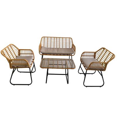 China Modern outdoor plastic rattan simulation rattan garden leisure sofa table and chair four-piece set for sale