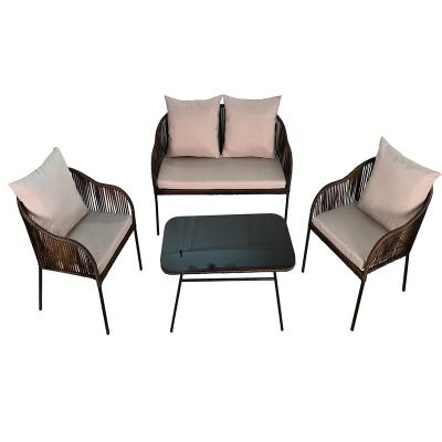 China Outdoor Handwoven Sofa Courtyard Rattan Sofa Balcony Chair Tea Table Easy Carry Four-Piece Set for sale