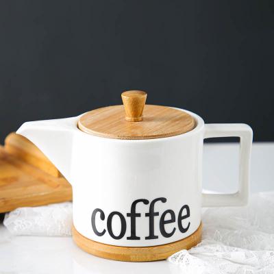 China New Design Modern Home Hotel Drinkware Large Tea And Coffee Ceramic Pot With Bamboo Lid for sale