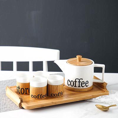 China Hot Selling Restaurant Porcelain Tableware Viable Ceramic Coffee Cup Mug Coffee Tea Sets With Bamboo Stand for sale