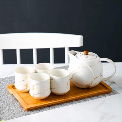 China Viable Afternoon Popular Luxury White Marble Mug Home Porcelain Ceramic Tea Cup Sets for sale