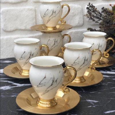 China Restaurant Sustainable Luxury White Mug Home Office Style Turkey Marble Ceramic Coffee Cup Mugs Set With Gold Saucer for sale