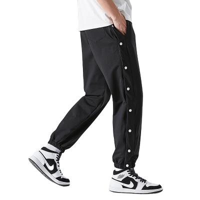 China 2022 QUICK DRY Best Selling Spring And Summer Fashion Casual Button Loose Breasted Sports Tie Pants Full for sale