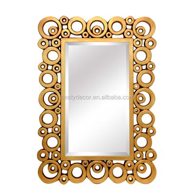 China Eclectic Golden Decorative Antique Hollow Pattern Material PU Ornate Wall Mirror for sale