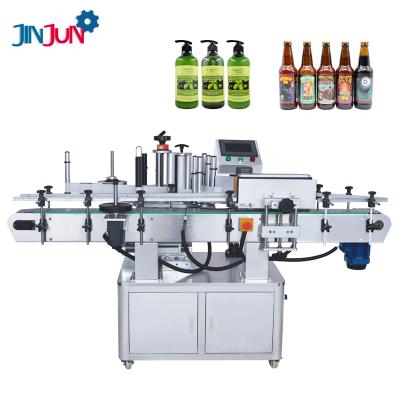 China Food JINJUN Automatic Round Bottle Single Side Labeling Machine For Essential Oil Bottle Face Cream Bottle for sale