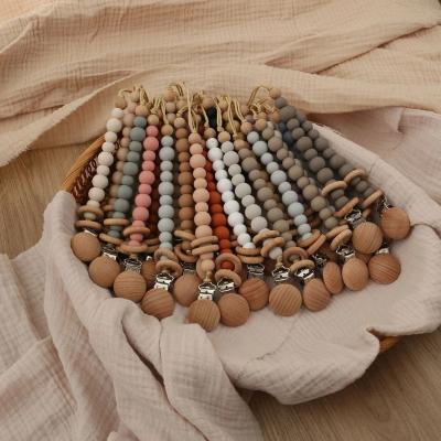 Κίνα Wooden Bead Pacifier Chain Clip Soothe Baby Silicone Beads Anti Drop Pacifier Chain προς πώληση