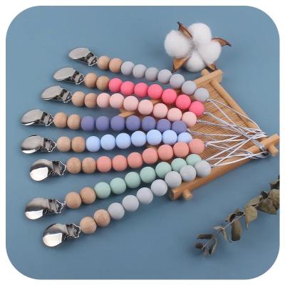 中国 Eco Friendly Pacifier Chain Clip Holder Dummy Loop Silicone Teether Bead Holder 販売のため