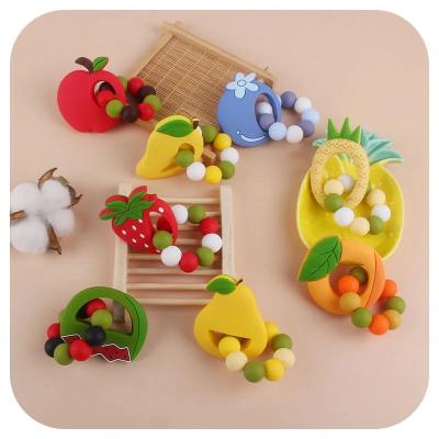 China Food Grade Newborn Teething Toys Silicone Tiny Rod Nurse Baby Teether zu verkaufen