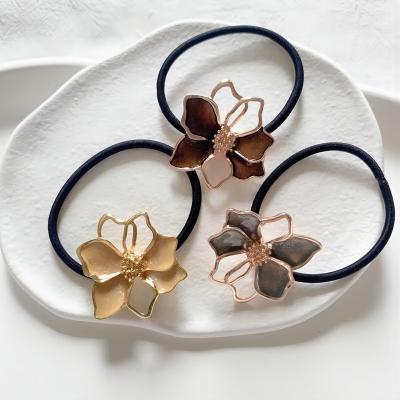 China High quality Korean Simple Metal Flower Hair Tie Simplicity Fashion Alloy Hairband Accessories for sale