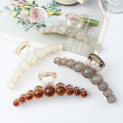 China Girls' Hair Decoration Women Girls 14CM Plastic Pearls Hair Claw Clips Oversized Resin Transparent Hair Clips Wholesale for sale