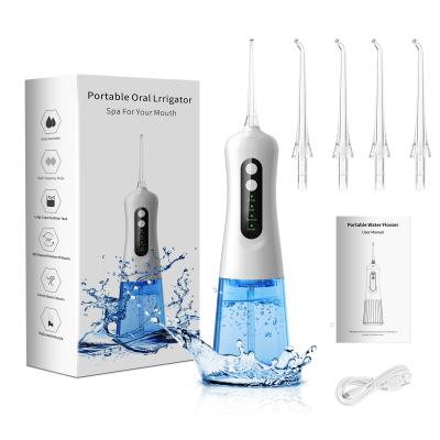 China IPX7 Waterproof Portable Irrigator USB 4 Mode Rechargeable Dental Water Flosser Oral Irrigator With 4 Tips 300ML IPX7 Waterproof for sale