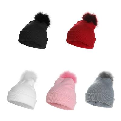 China Wholesale Fashion COMMON Logo Girls Cap Hat Winter Custom Made Knitted Pom Pom Hat For Women for sale