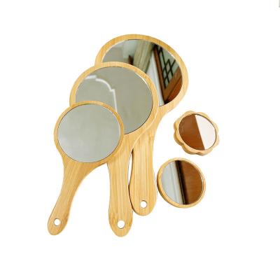 China Customized Contemporary Eco-friendly Bamboo Wooden Mirror Laser Engraving Logo Pocket Mirror Makeup Hand Mirror Dressing Mirror for sale