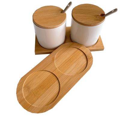 China Sustainable Custom Nordic Ceramic Seasoning Jar Household Seasoning Box Salt Pot Set With Bamboo Tray for sale