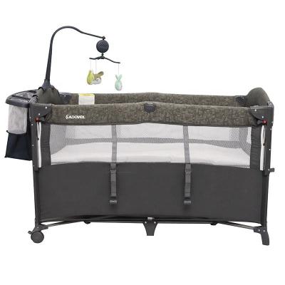 China Lounge OEM Plastic Baby Products Euro American Standard Baby Travel Bed with Spare Baby Cradle and Hutch for sale