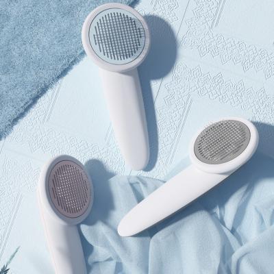 China Small Animals Remove Dog Hair Removal Pet Electric Automatic Telescopic Hair Removal Self-cleaning Comb for sale