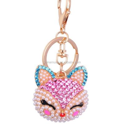 China Hot Selling Fashion Alloy+Crystal+Pearl Fashion Coin Holder Wallet Car Accessory Cheap Fox Form Alloy Crystal Key Ring Pearls Key Chain for sale