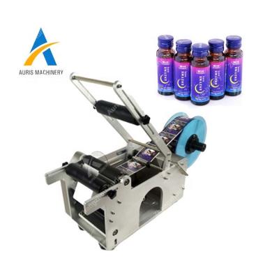 China Single Operation Sticker Machine Label Wrap Round Bottle Labeling Machine for sale