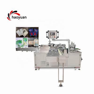 China PE Disposable Plastic Inline Surgical Glove HY-100 HAOYUAN Towell Food Glove Hand Glove Packing Machine Inner Machinery for sale