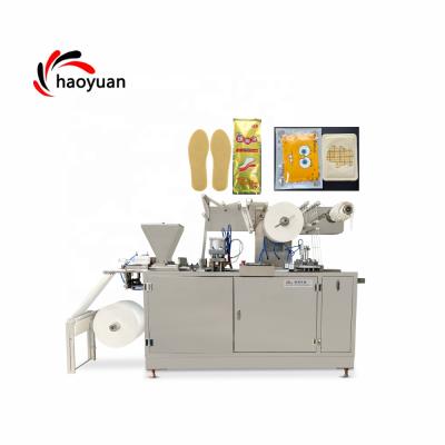 China Hotels HY-330 Haoyuan Automatic Horizontal Foot Body Medical Powder Warmer Pad Heating Pack Wrapping Making Machine for sale