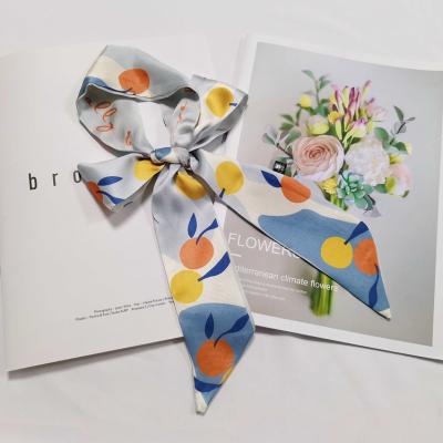 China Autumn Narrow Fashion Korean Silk Wholesale Floral Ribbon Spring Scarves Small Fashion Style Silk Scarf for sale