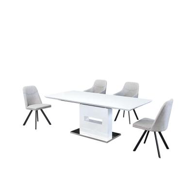 China Modern luxury European fabric dining table set durable 8 seater furniture Foshan tabels and chair cheap price for sale