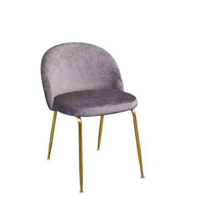 China Comfotable frango velvet dining chairs lion head button tufted velvet dining chair metal legs gold brass for sale