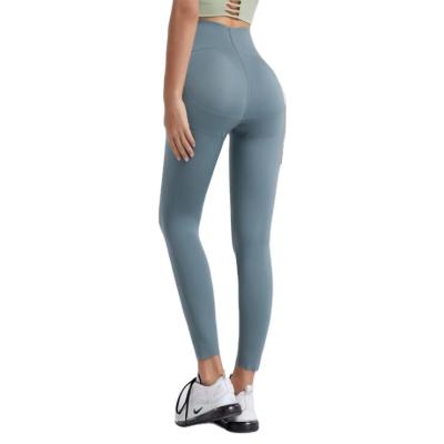 China Wholesale Women's Breathable Leisure Eco-Friendly Clothing Yoga Pants 2021 Tight High-Waisted Abdomen Stretch Sports Leggings for sale