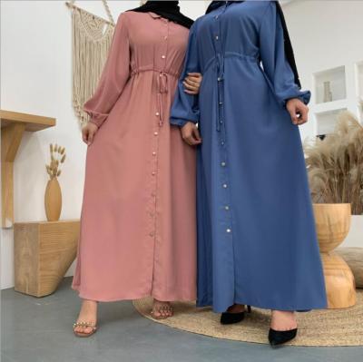 China Modest Muslimah Styling Wholesale Women's Muslim Abaya dresses 2021 Autumn Dubai lapel fashion slim long sleeve dress solid color button full for sale