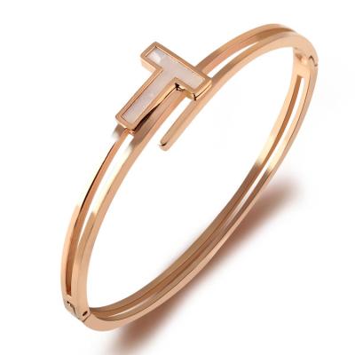 China New FASHIONABLE Female Titanium Steel Bracelet Rose Quartz Gemstone Classic Letter T Bracelet Rose Gold Plated Cuff Bangle Jewelry for sale