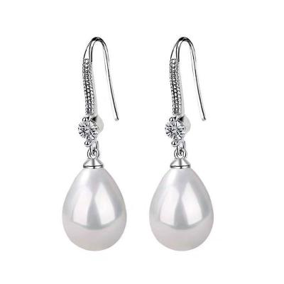 China Fashion TRENDY Exquisite Silver Color Pearls Drop Earrings For Women Shiny Red Green Round Pearl Earrings for sale