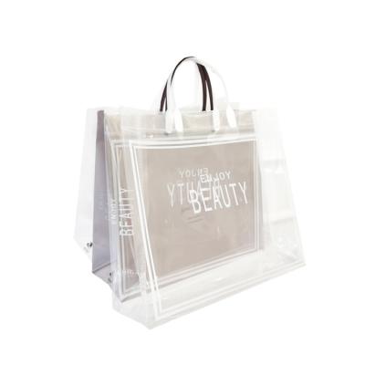 China Fashionable Women Durable Plastic Wholesale Custom Clear Tote Bag Stage Approved Transparent PVC Shop Gift Bag Makeup Bag for sale